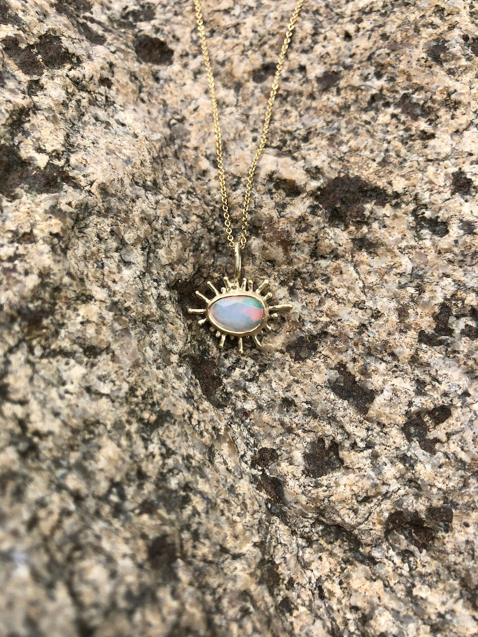 Fairmined gold pendant with opal / SUNBURST